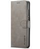 Huawei P30 Lite Portemonnee Bookcase Hoesje Magneet Sluiting Grijs
